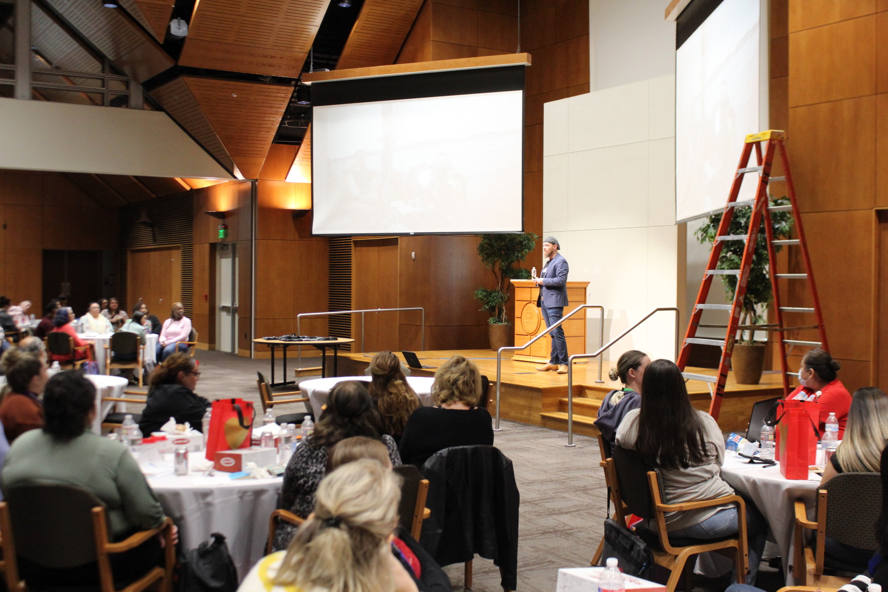 Ari Speaking at Event