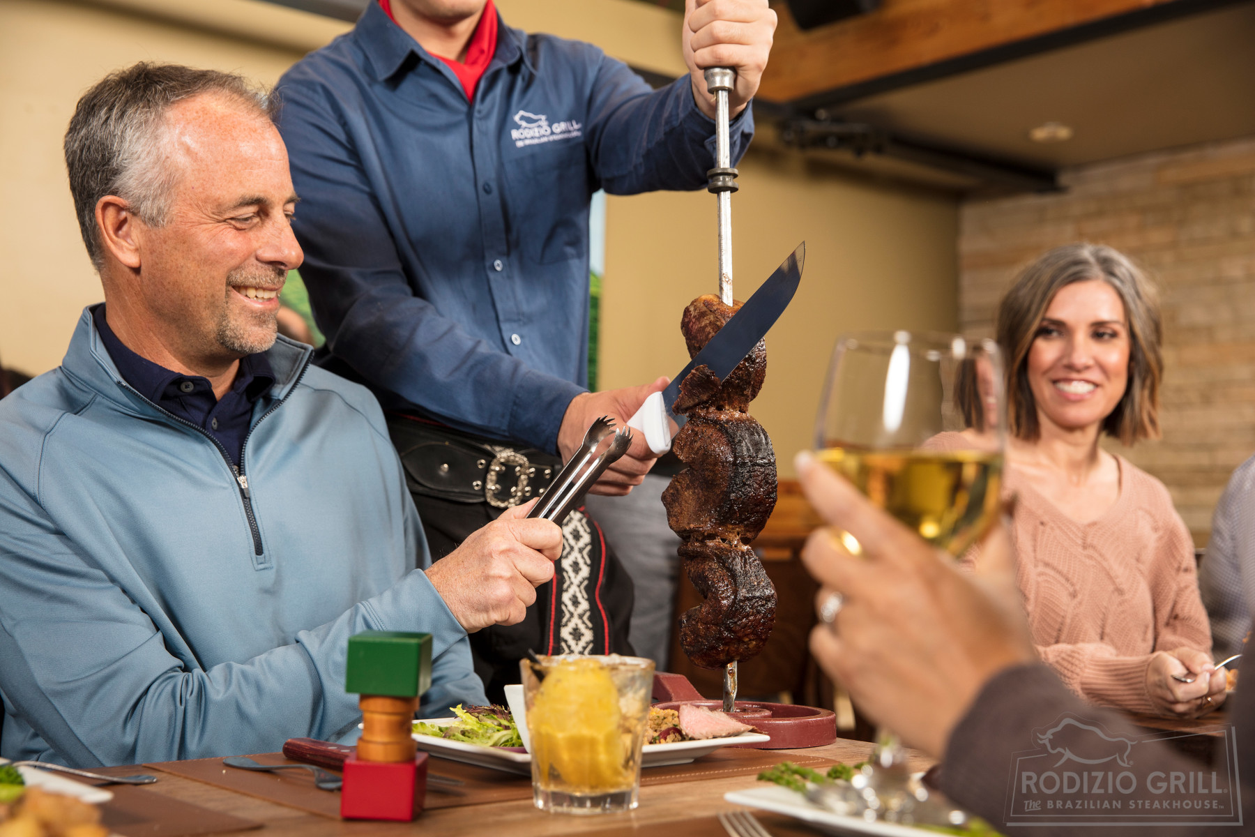 Family dining at Rodizio Grill Brazilian Steakhouse