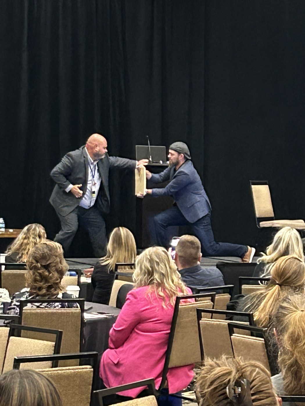 Volunteer Breaking Through Board