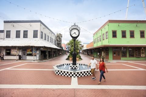 couple walking down the street in Old Town Kissimmee