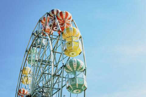 Top of Old Town Ferris Wheel with blue sky behind