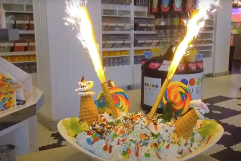 Large sundae on table with sparklers