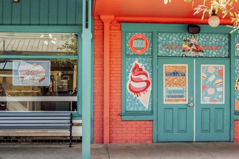Outside ice cream store with orange and turquoise paint at Old Town.