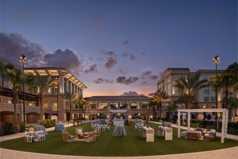 Outdoor lawn at Gaylord Palms Resort & Convention Center at sunset.