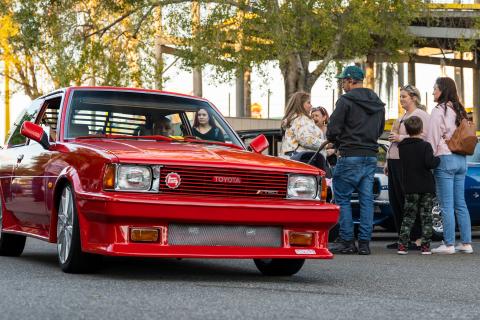 Red import car at Old Town Kissimmee.