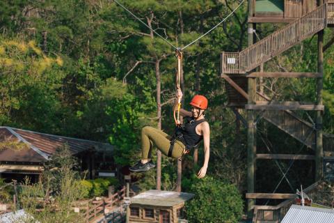 Caitlin Dechelle zip lines at Gatorland