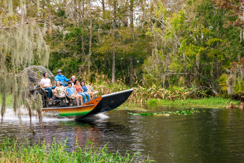 Family riding an airboat at Wild Florida.