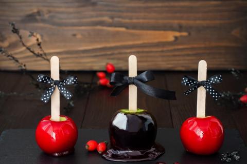 Red and black candied apples.