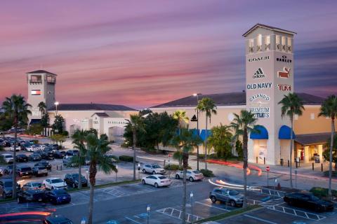 Exterior night photo of Orlando Vineland Premium Outlets