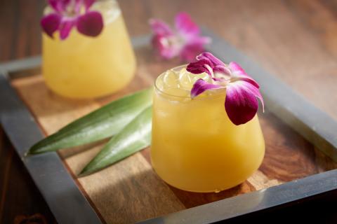 Yellow tropical mocktail from the Edison at Disney Springs.