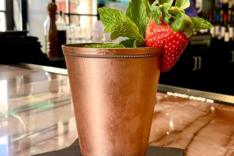 Copper glass with mint and strawberry from Reggiano's in Celebration.