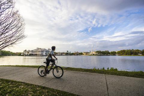 Boy riding a bike in Celebration Town Center