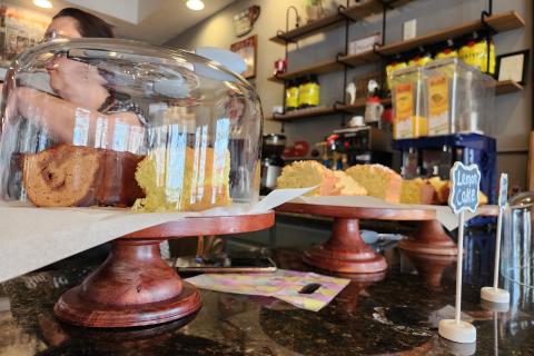 A close up image of slices of yellow cake in a display on the counter of Buchito in Downtown Kissimmee.