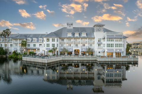 Exterior shot of the Inn at Celebration over a lake