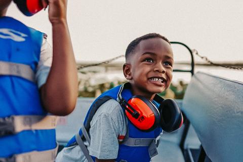 Two young boys on an air boat in Kissimmee