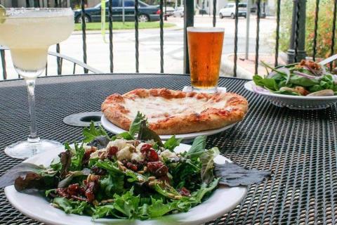 A pizza and salad at Broadway Pizza Bar