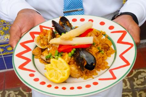 A colorful dish of Paella at Columbia Restaurant Celebration in Kissimmee, Florida