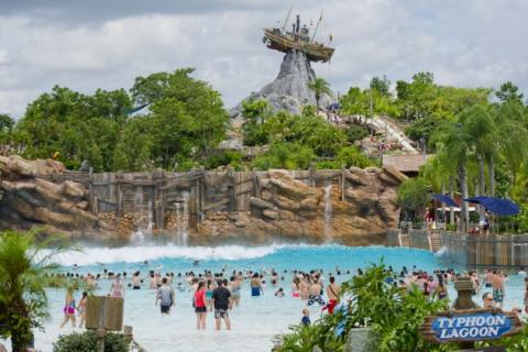 Panoramic shot of pool at Disney's Typhoon Lagoon with shipwreck sculpture in the background