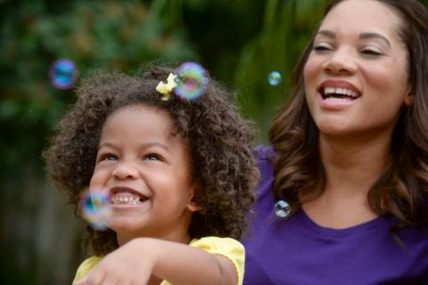 Mother and Daughter, Blowing Bubbles