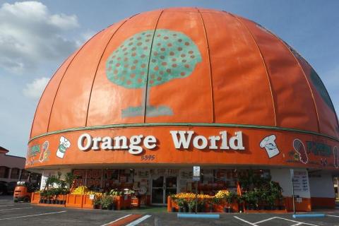 A large orange-shaped building houses Orange World in Kissimmee