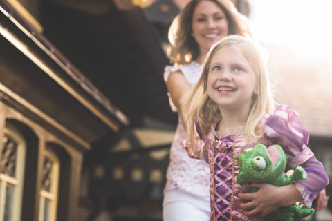 Mother and daughter walking through Walt Disney World