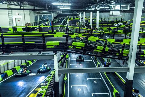 An image of an indoor go-cart racing track.