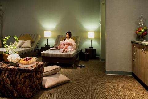 A woman relaxes at Relache Day Spa