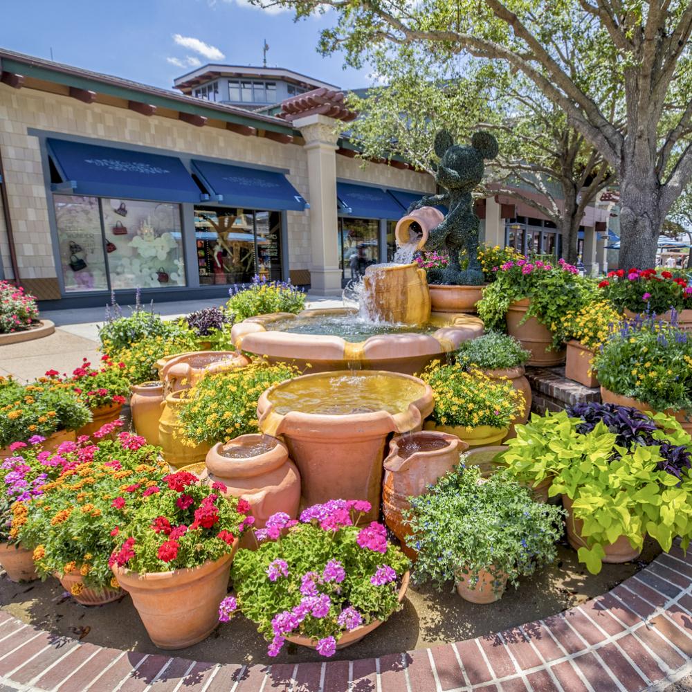 Elaborate water feature with flowers at Disney Springs