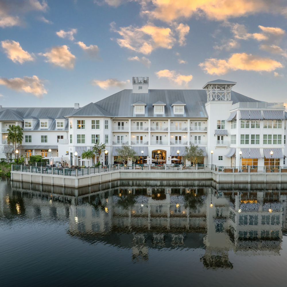 Exterior shot of the Inn at Celebration over a lake