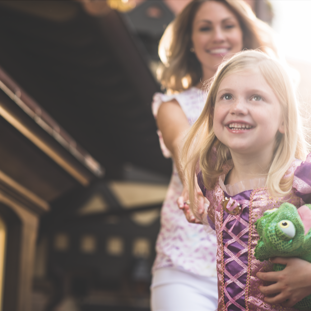 Mother and daughter walking through Walt Disney World