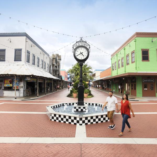 couple walking down the street in Old Town Kissimmee