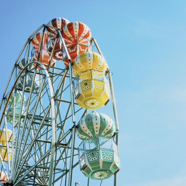 Top of Old Town Ferris Wheel with blue sky behind