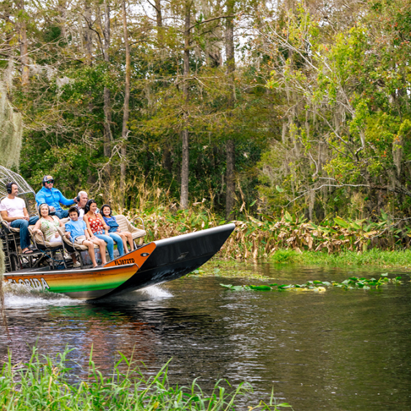 Family riding an airboat at Wild Florida.