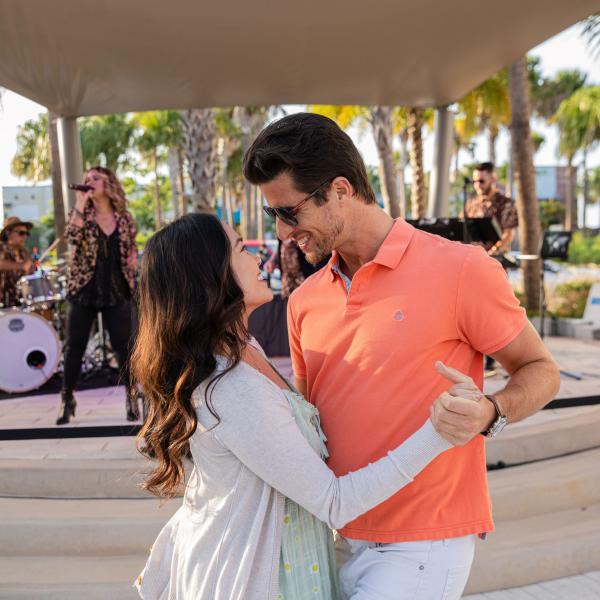 Couple dancing to live music at Promenade at Sunset Walk
