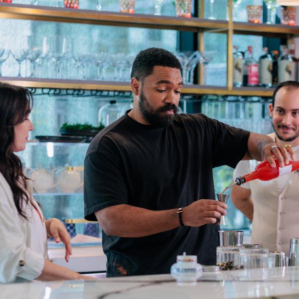 Jordan Howlett and Jen Bonner bartend at Salt and Cellar within the ette hotel.