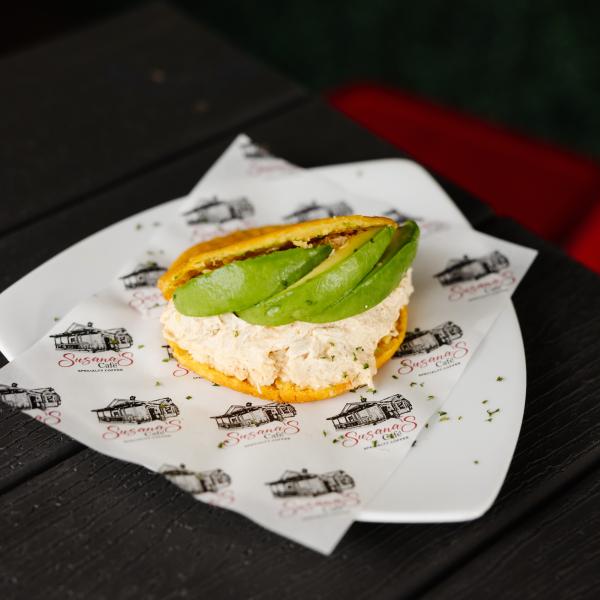 Chicken and avocado arepa on a plate