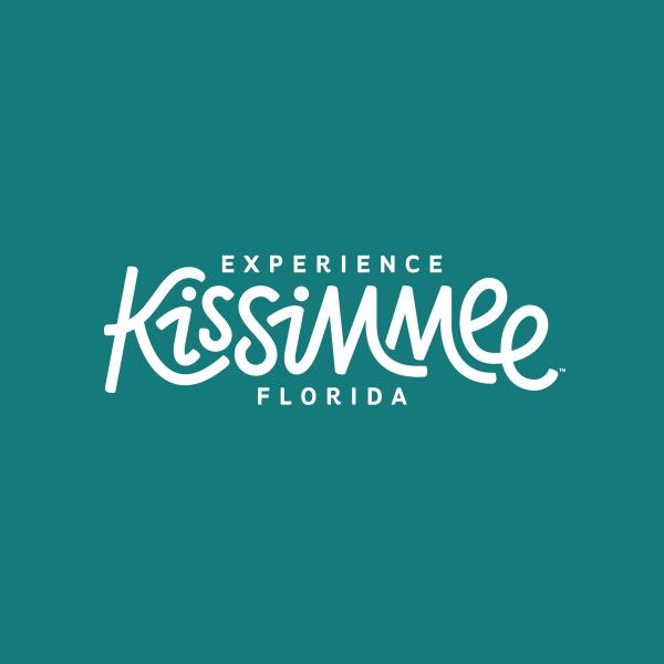 White EK Logo on Teal background