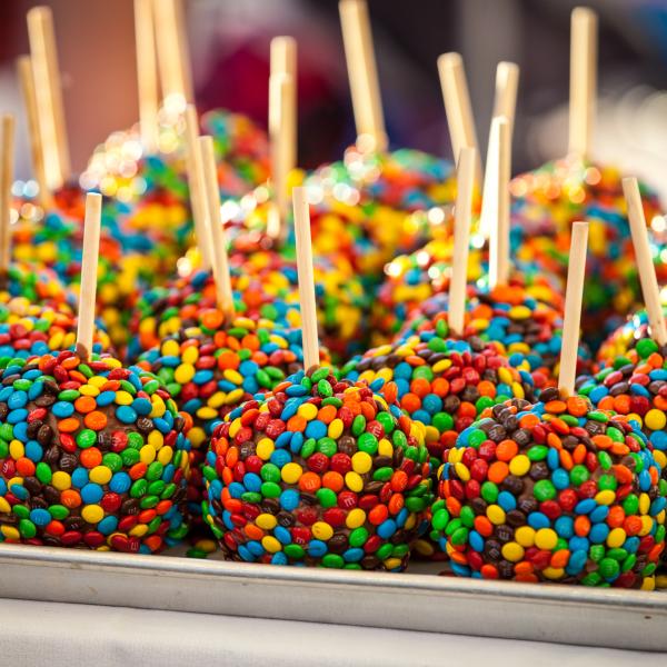 Cake pops covered in sprinkles.