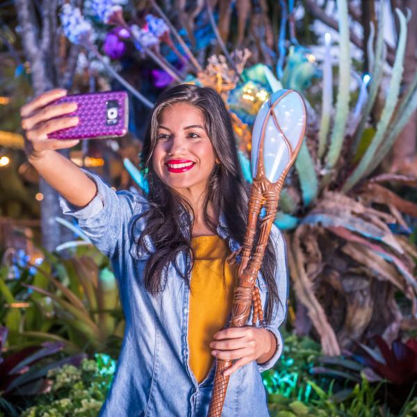 A girl taking a selfie in Disney World