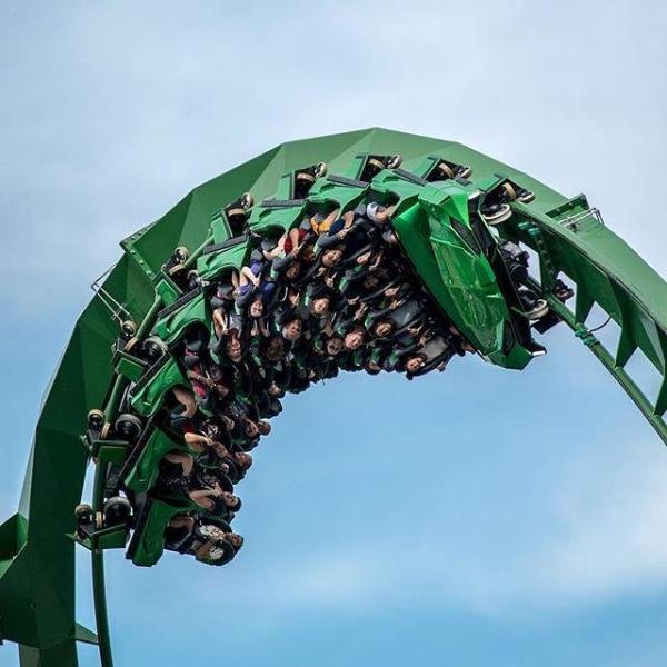 A roller coaster going upside down.