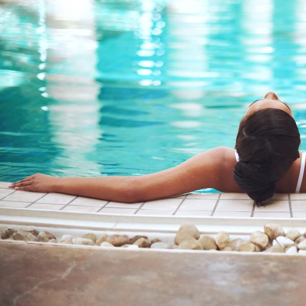 Woman relaxing in pool